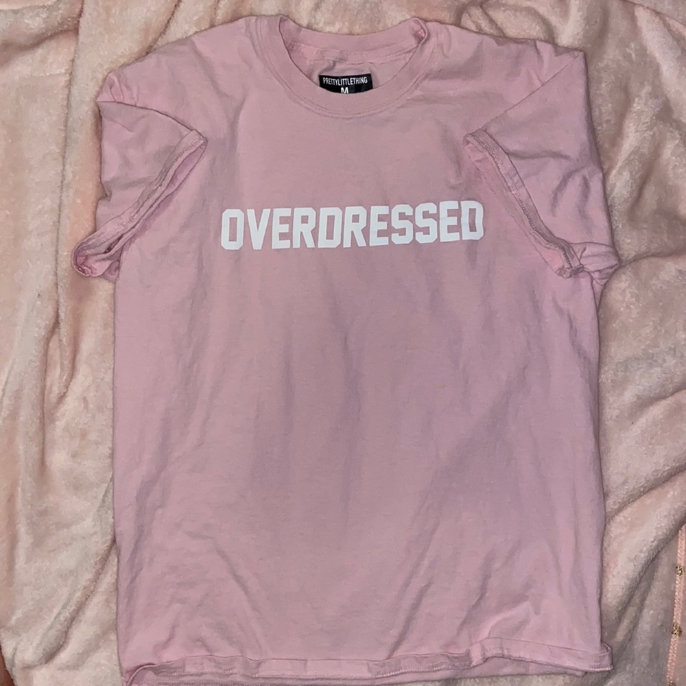 PrettyLittleThing “Overdressed” Baby Pink Tee, Size Medium